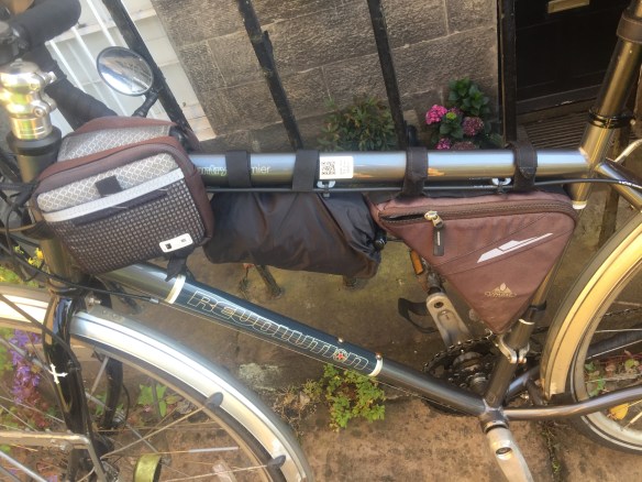 My bike carrying a raincoat