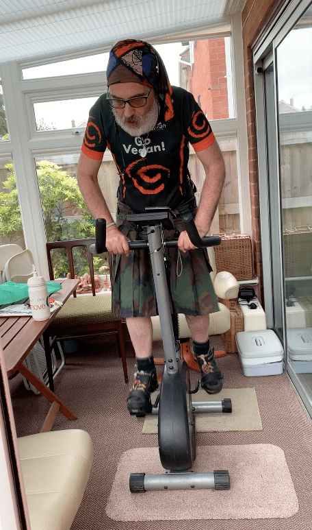 Bruce trying to spin on an exercise bike